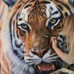 Artist with her tiger painting